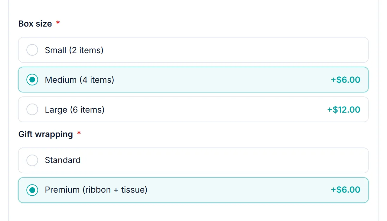 WooCommerce tiered upsell options: Box size tiers Small, Medium +$6.00, and Large +$12.00, with Standard and Premium gift wrapping tiers